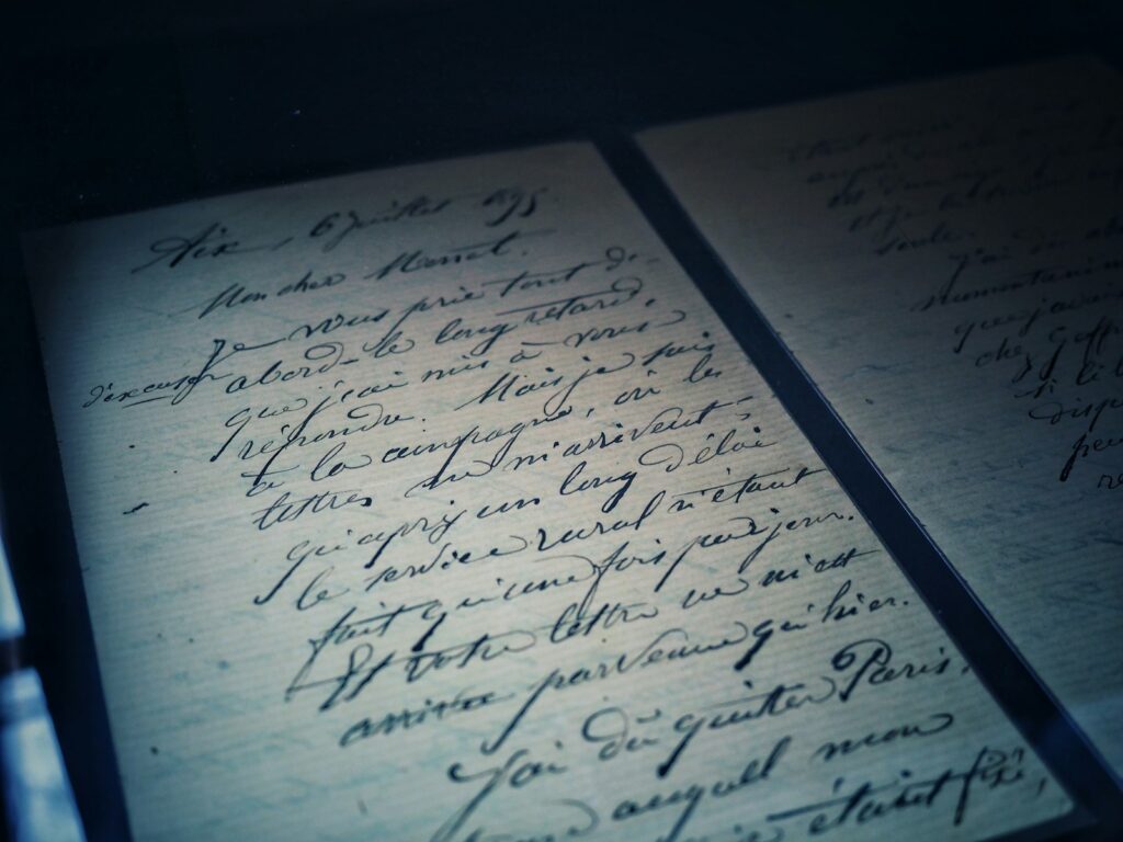 open pad with calligraphy letters